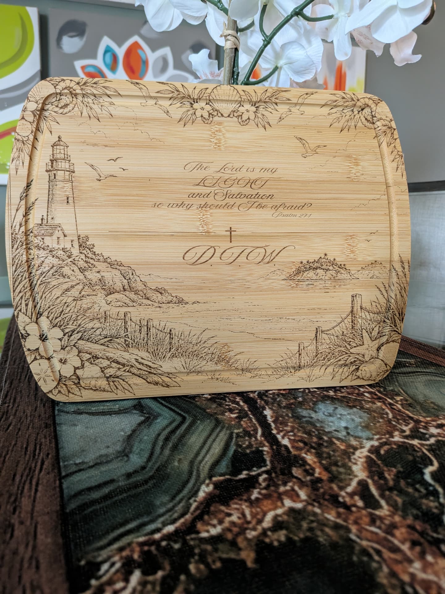 Engraved cutting board with a lighthouse scene and the verse The Lord is my Light and Salvation, Psalm 27:1